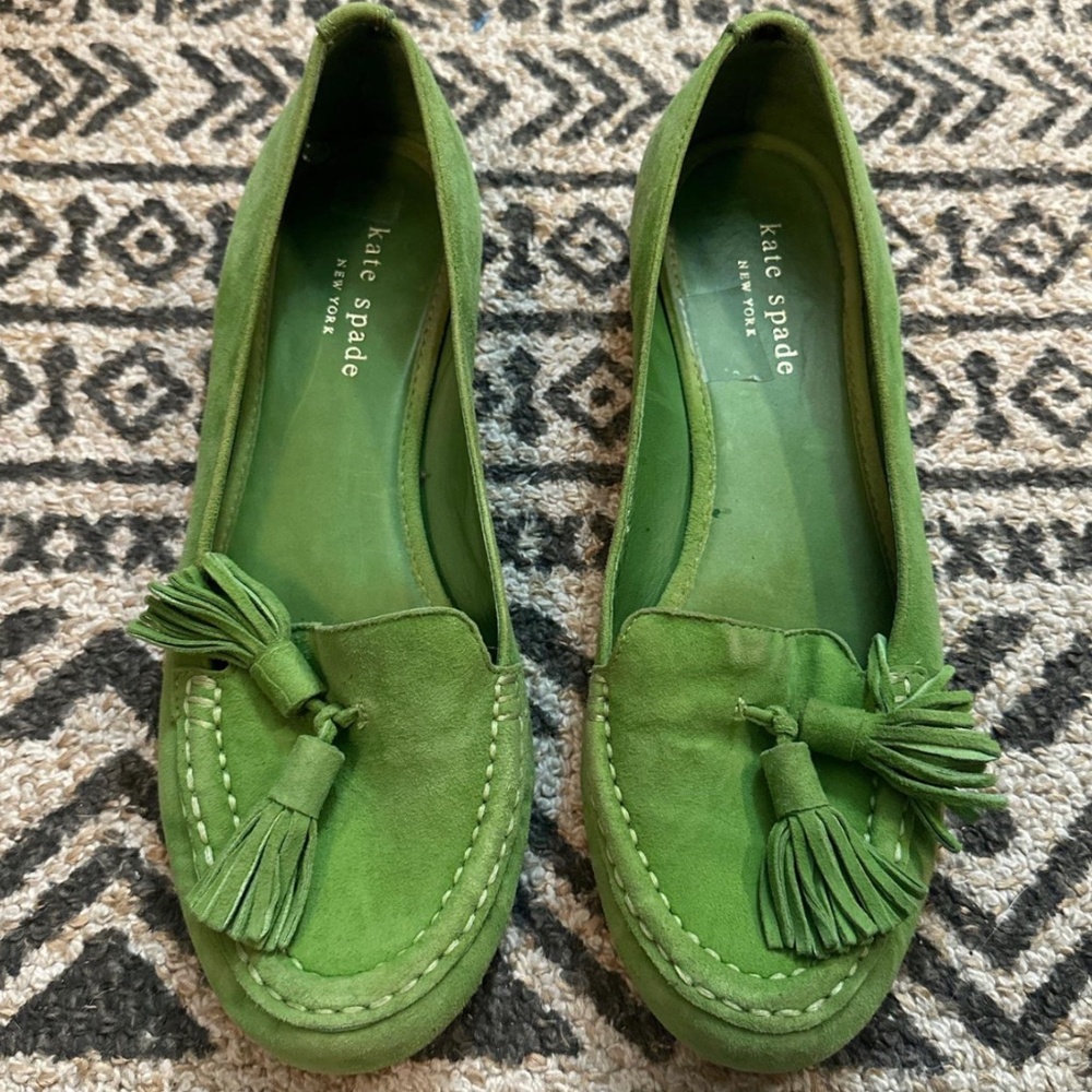Green suede Kate Spade loafers with tassel detail